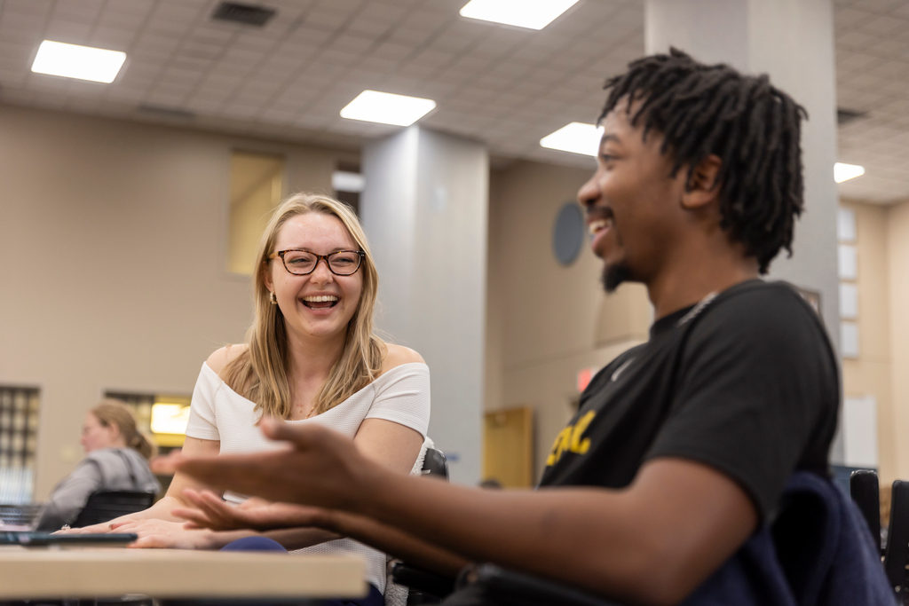Students laughing while meeting to study. Sam O'Keefe/University of Missouri