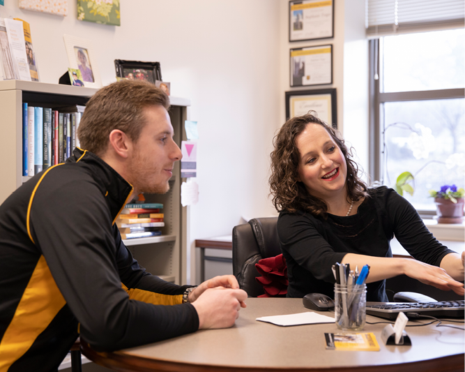 Student meeting with their advisor.