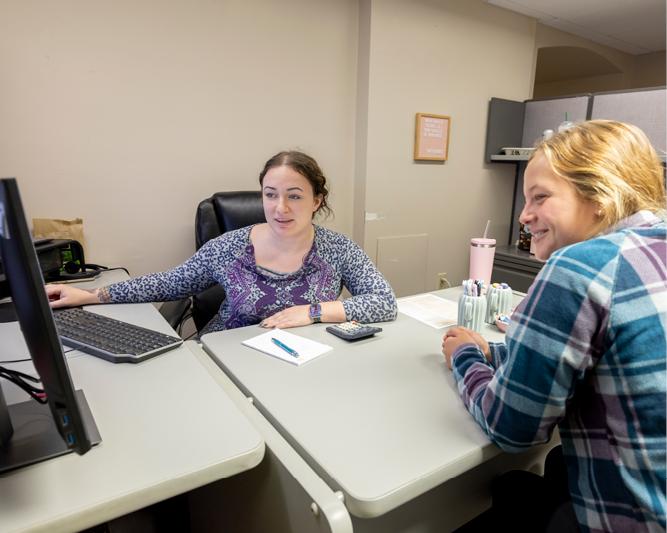 Student meeting with financial aid adviser.