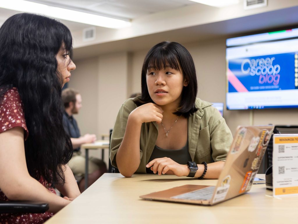 Student talking with Career Coach