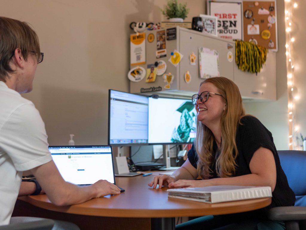 Academic advisor meeting with a student