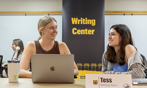 Students meeting in Writing Center.