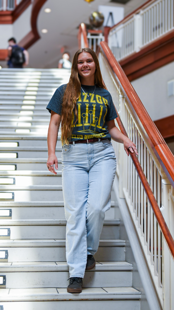 Janessa Duce on stairs.