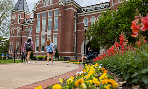 Students walking on campus.