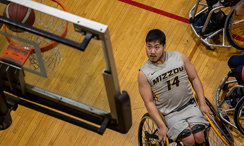 Mizzou Wheelchair Basketball player during game.