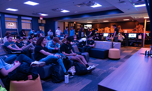 Students watching esports.