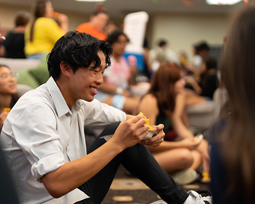 Student at Multicultural Center event.