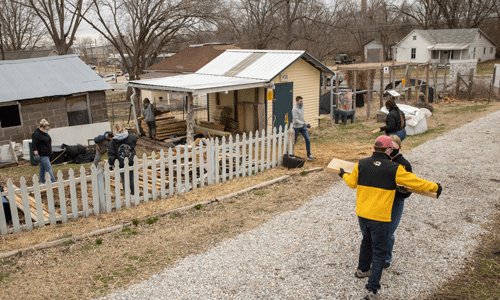 Mizzou students working on house repairs