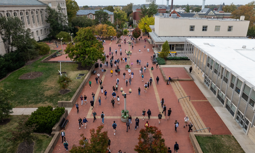 Picture of students walking on campus.