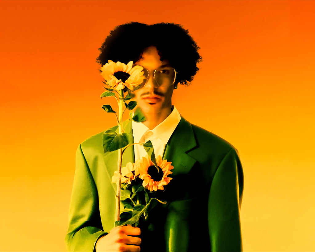 Latrell Hickem holding sunflowers in front of orange-yellow gradient background