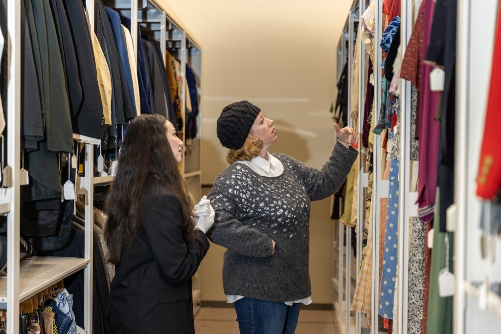 faculty and student engaged in textile and apparel management research