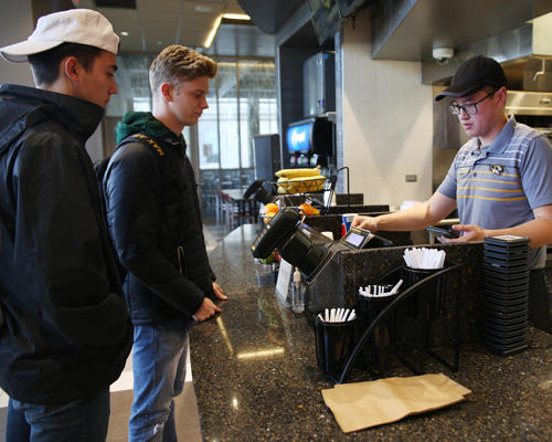 Students ordering food at Student Center.
