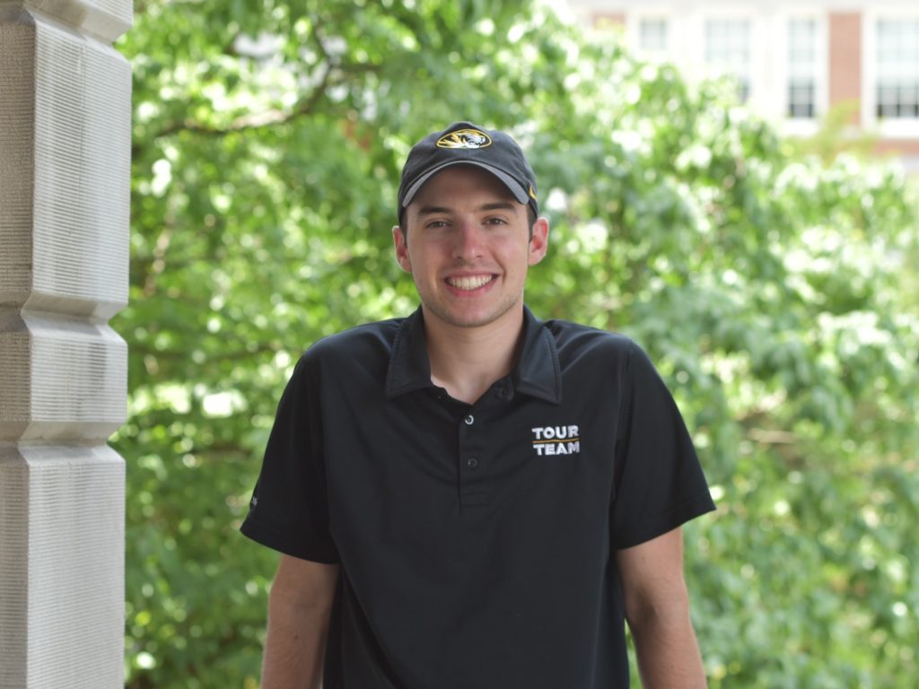 Darin Clayton smiles for a photo