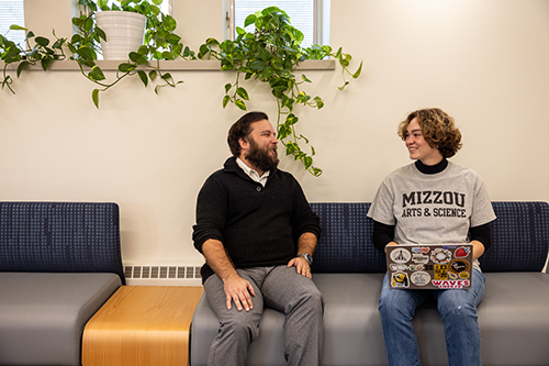 Student meeting with success coach.