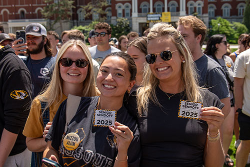 Students smiling at Senior Sendoff.