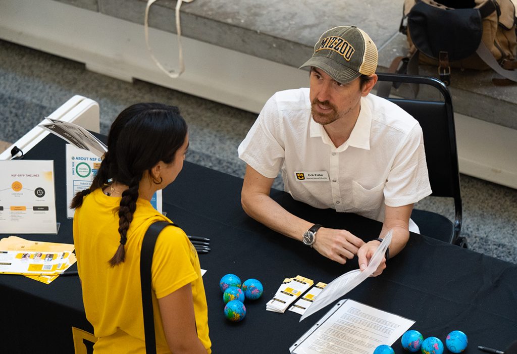 Student learning about fellowship opportunities.