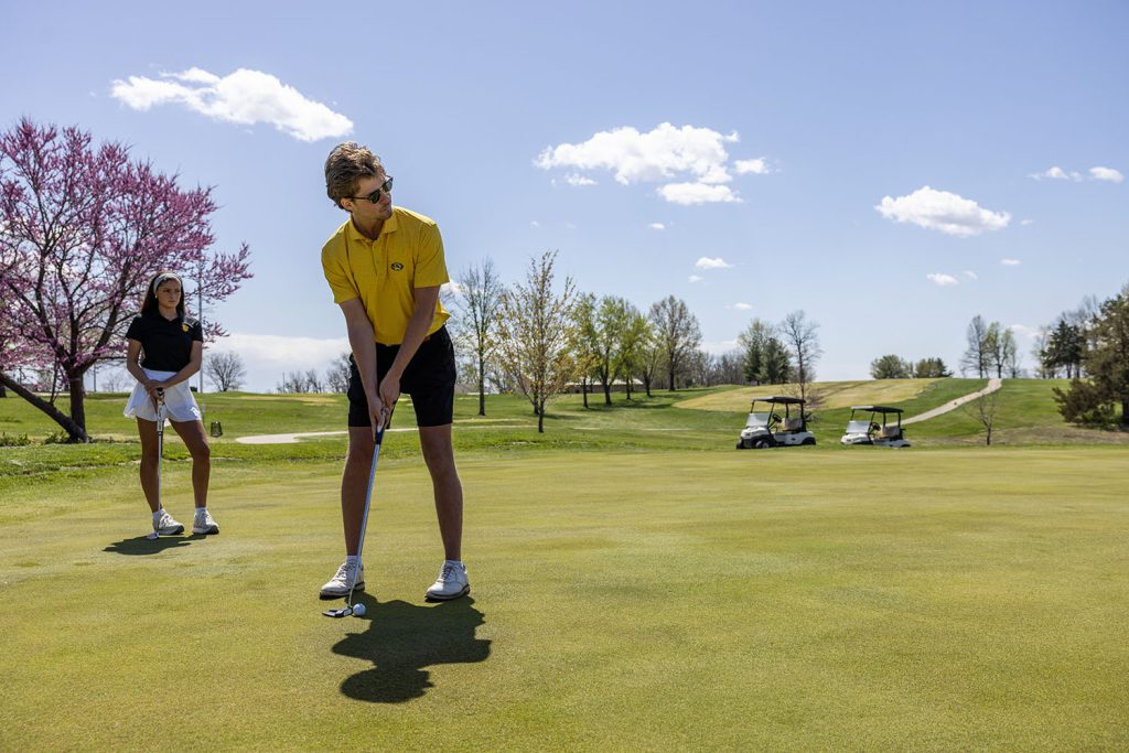 Student on Gustin Golf Course.