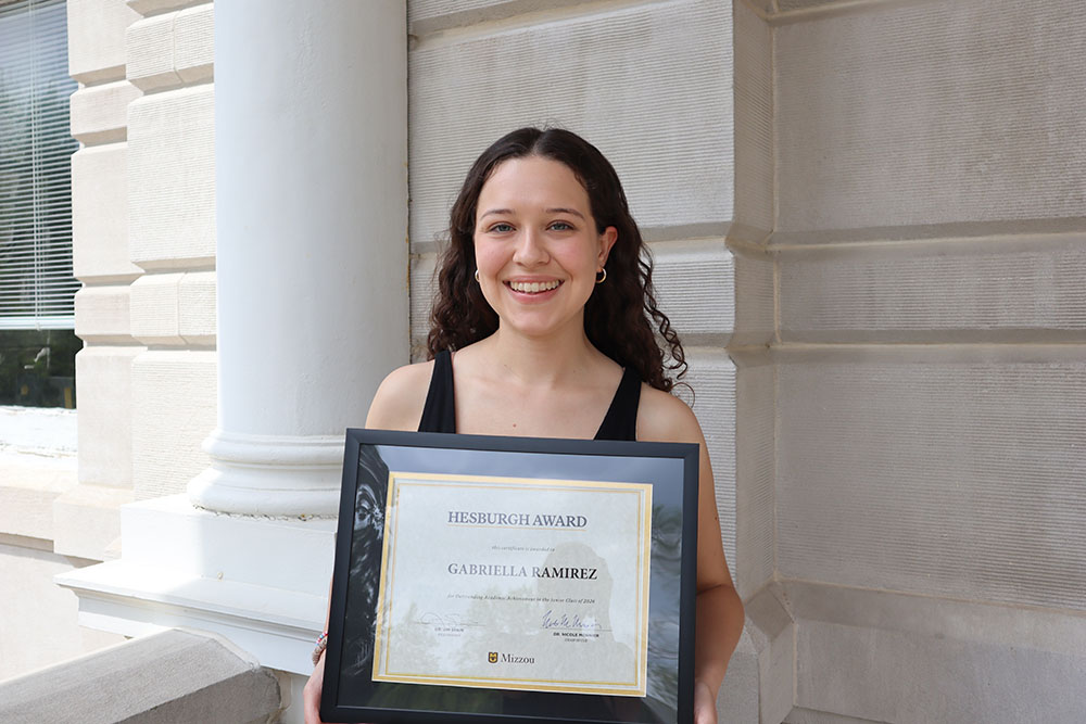 Gabriella Ramirez holding certificate.