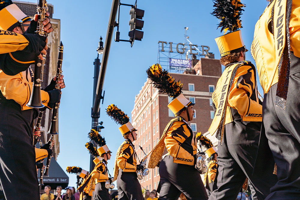 Marching Mizzou members walking in the Homecoming parade.