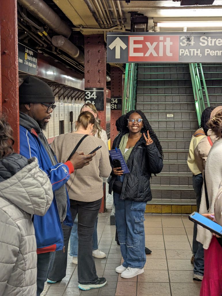 Candid photo of Jas Kinyatti at the subway station.
